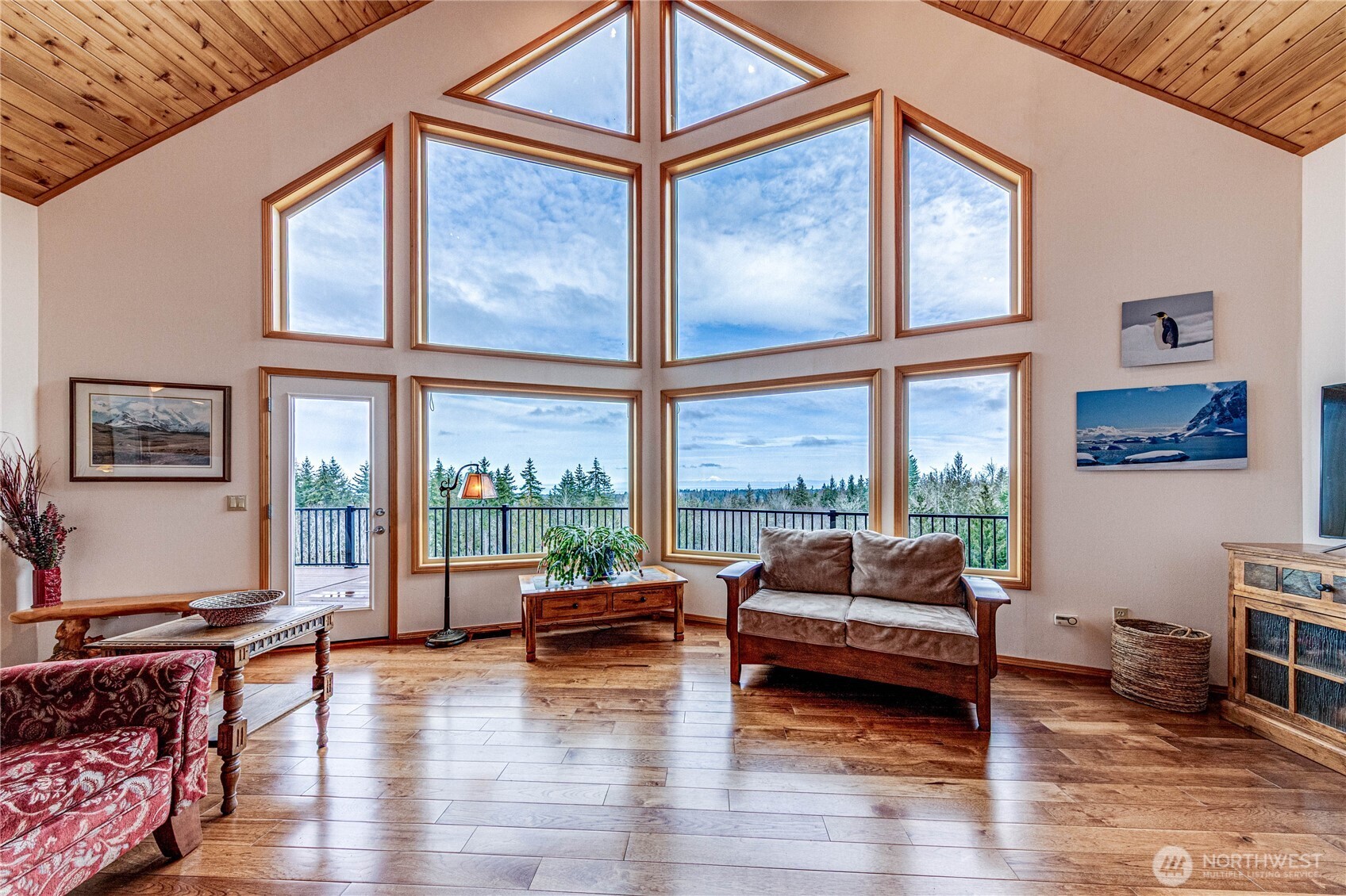 273 Harbor Heights Road Port Angeles, WA 98362 - Photo 9 of 40 a living room with furniture and a large window