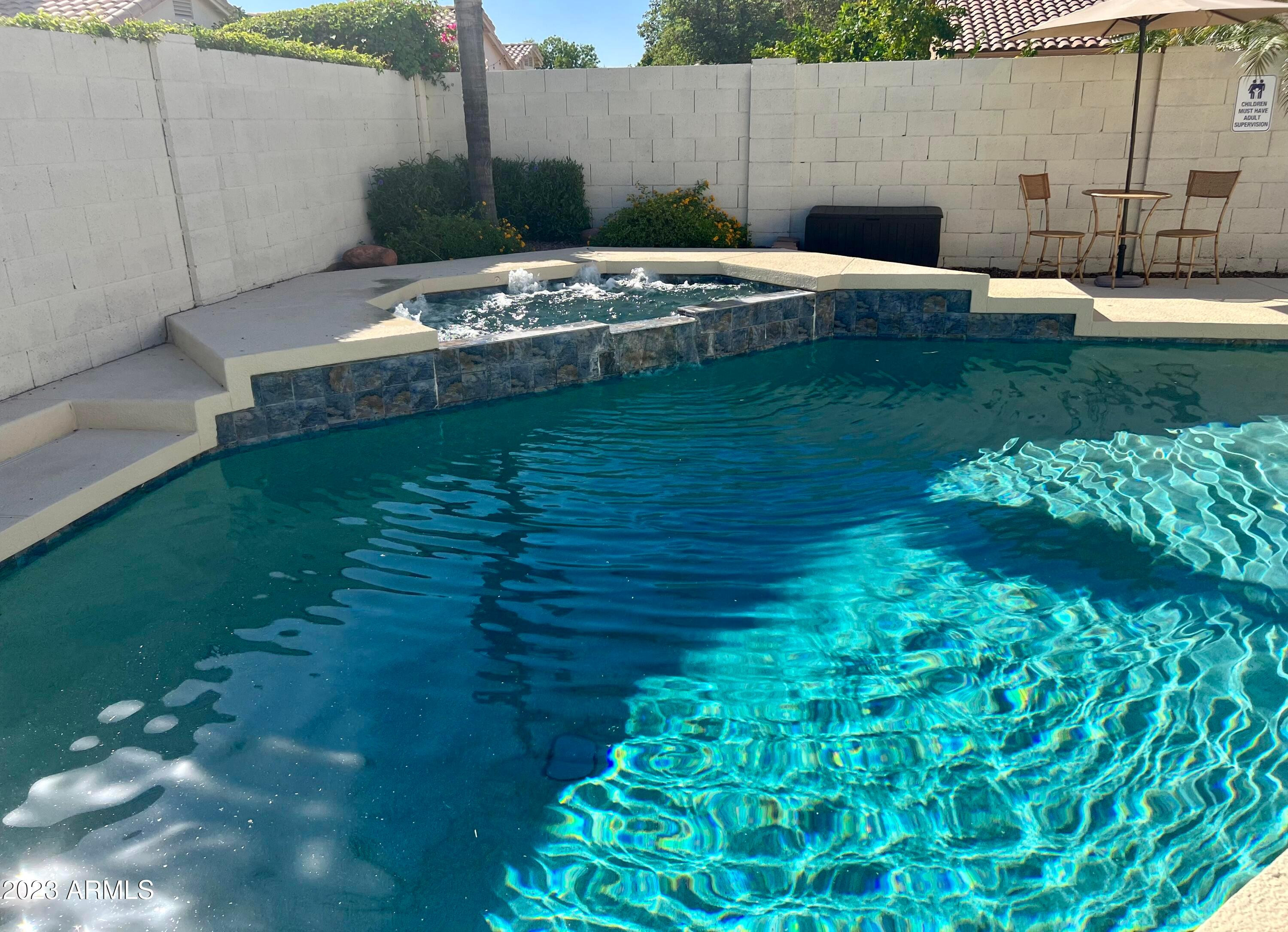 a view of a backyard with a garden