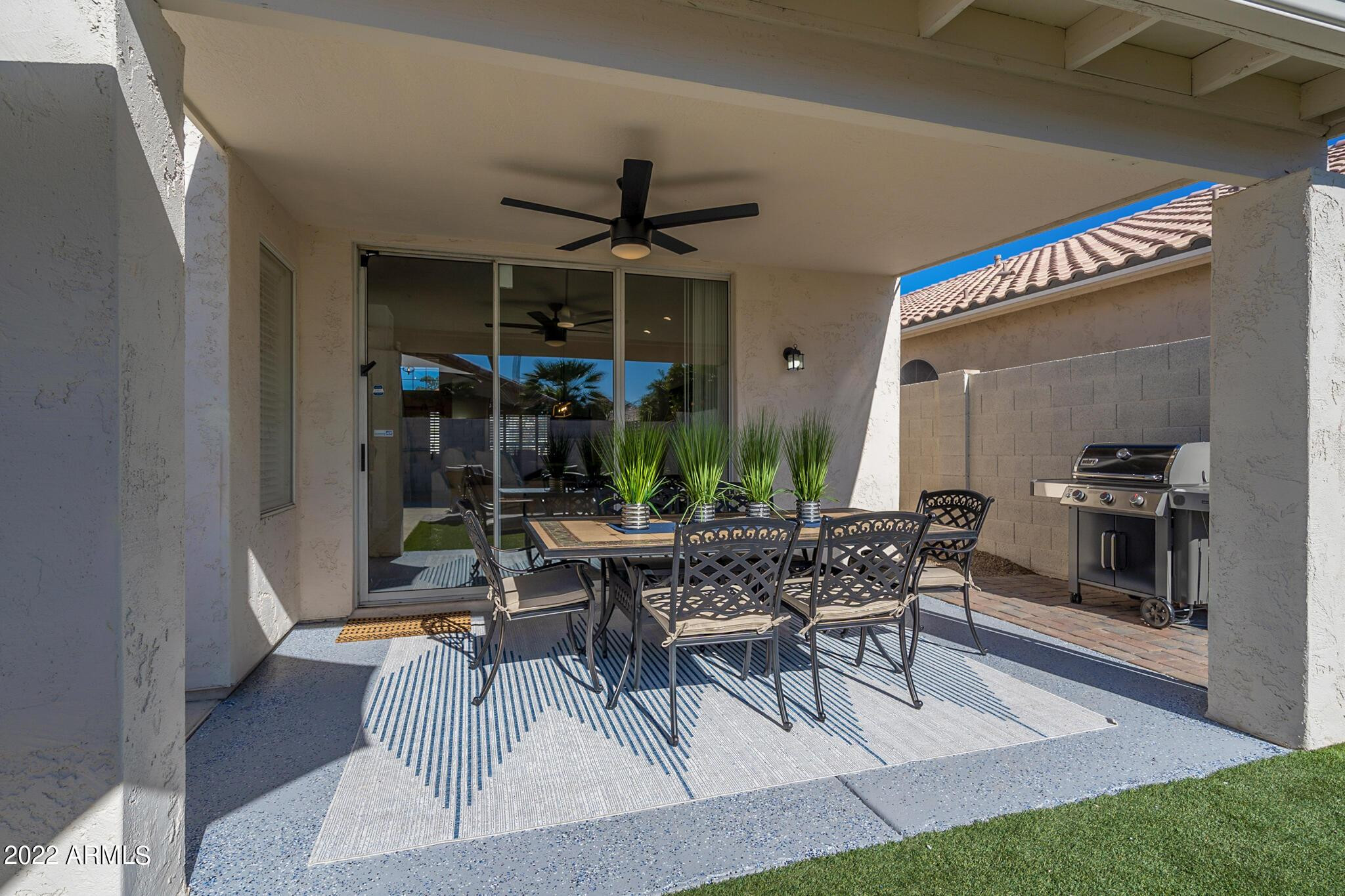 8661 East Gail Road Scottsdale, AZ 85260 - Photo 3 of 49 a view of a backyard with a patio and outdoor seating