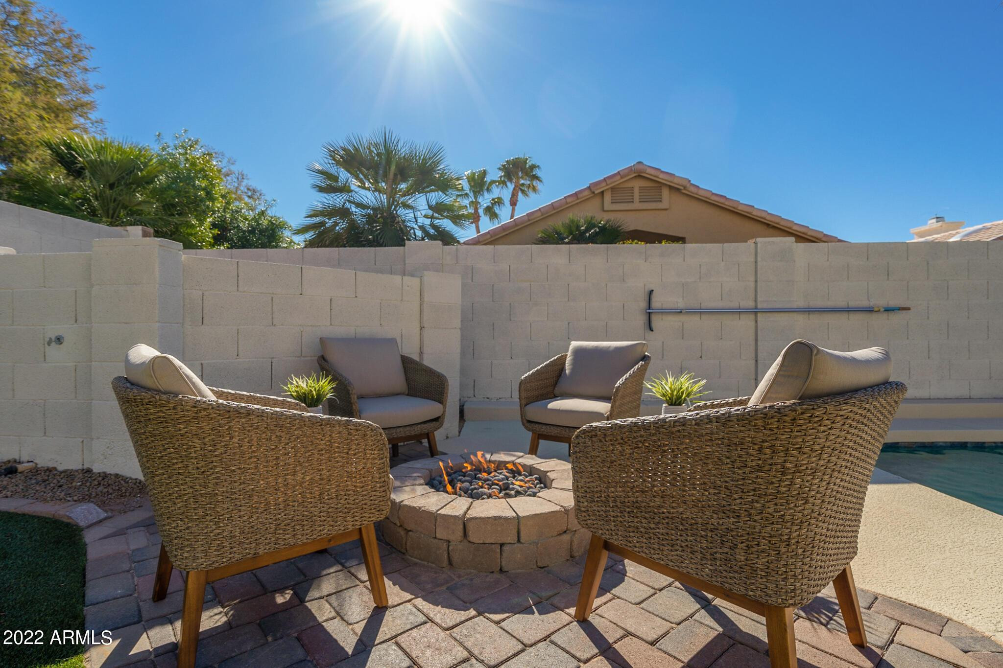 8661 East Gail Road Scottsdale, AZ 85260 - Photo 4 of 49 a view of a chairs and table in the patio