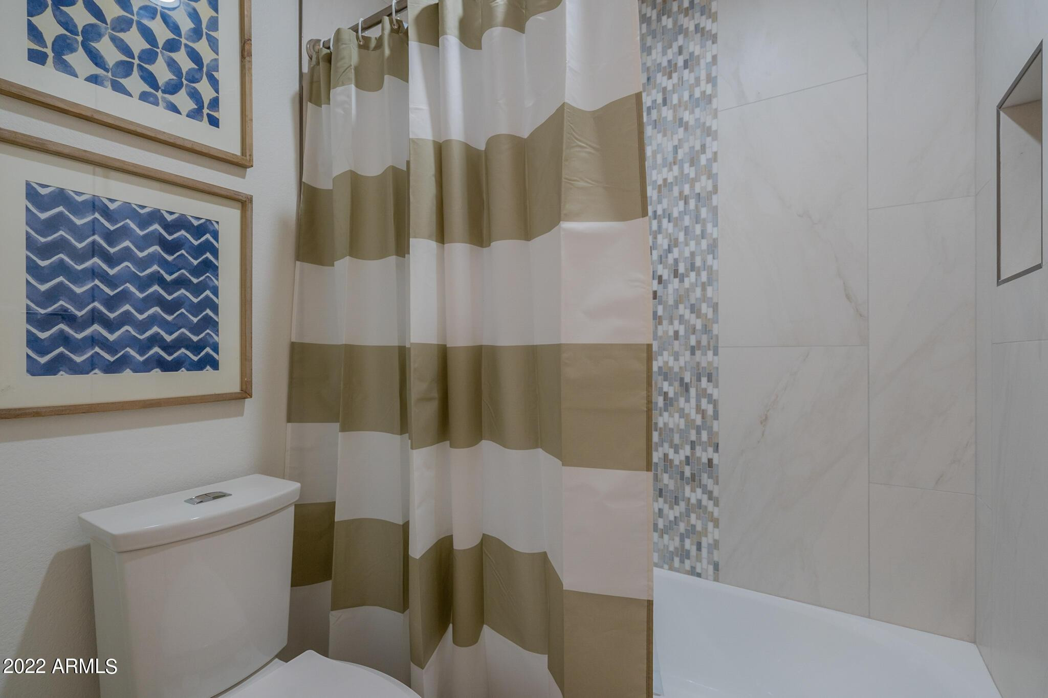 8661 East Gail Road Scottsdale, AZ 85260 - Photo 42 of 49 a bathroom with a toilet and a shower