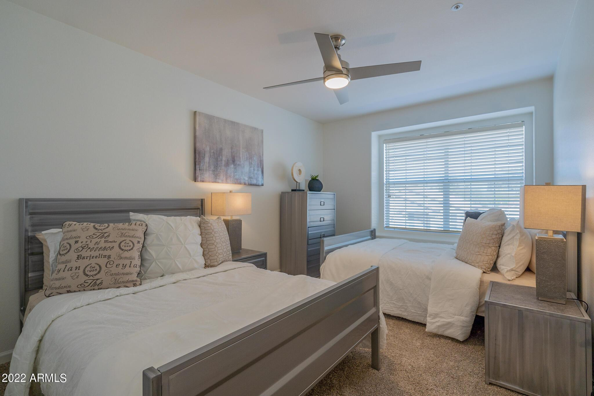 8661 East Gail Road Scottsdale, AZ 85260 - Photo 44 of 49 a bedroom with bed and window