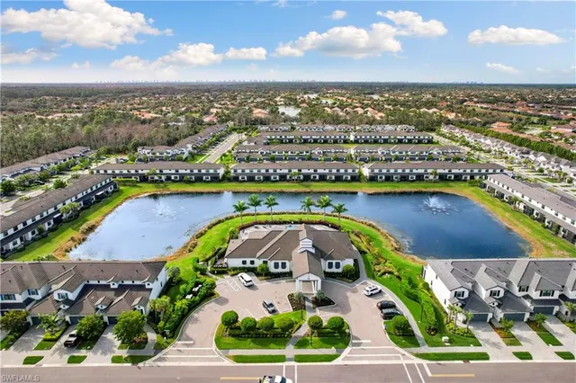 an aerial view of a swimming pool and outdoor space