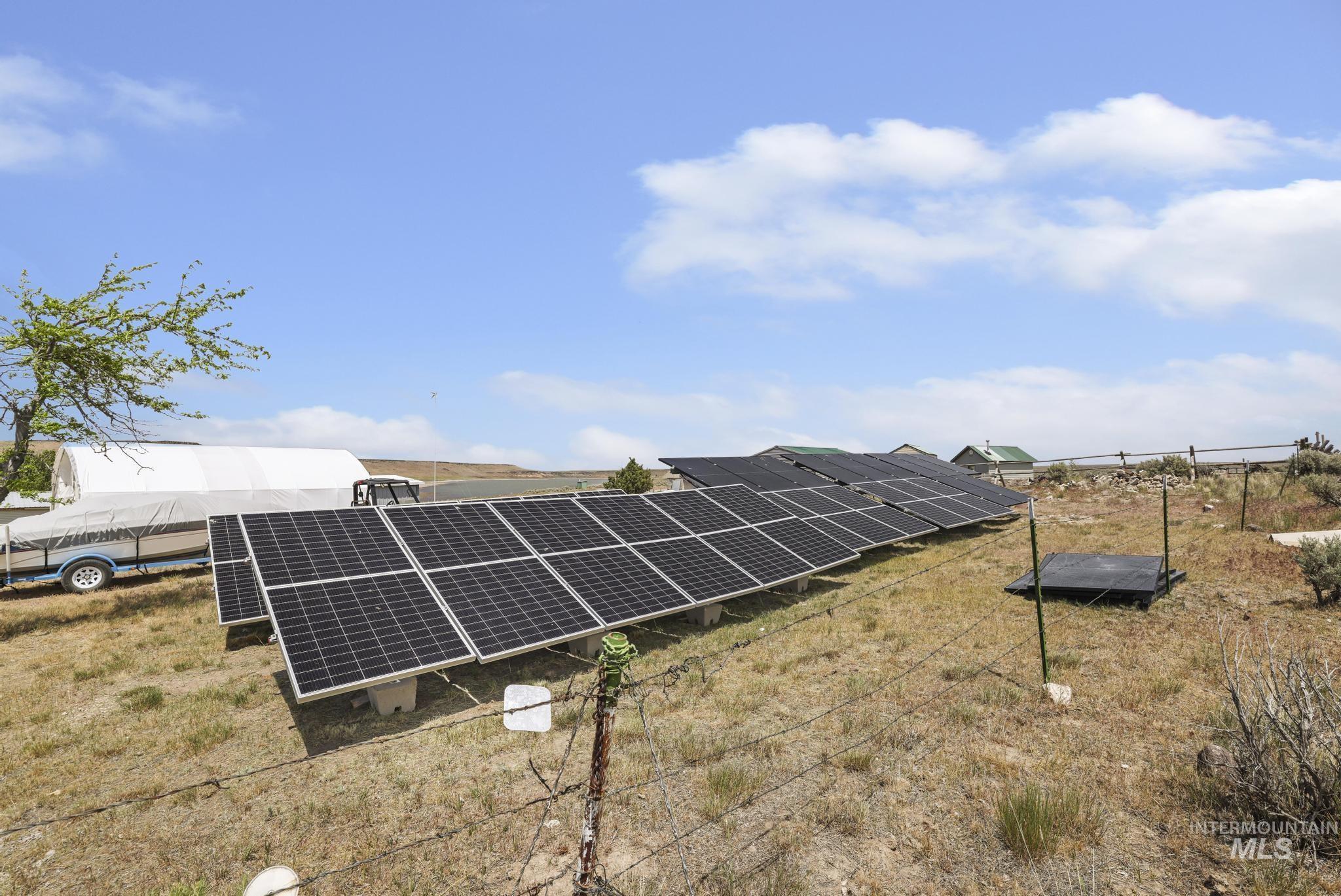 758 Cedar Crk Road Rogerson, ID 83302 - Photo 28 of 50 Extensive ground-mounted solar panel array