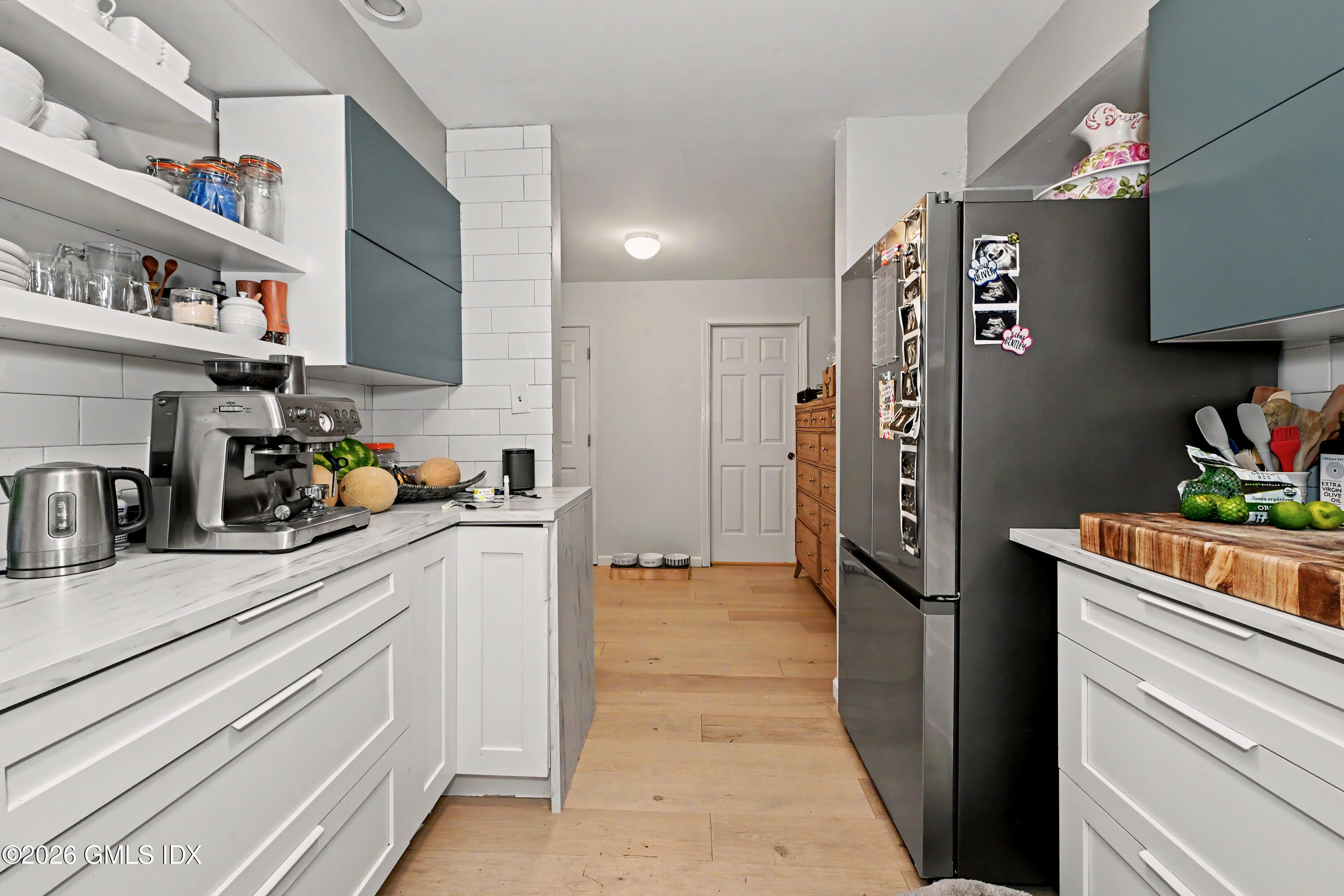37 Prospect Street Greenwich, CT 06830 - Photo 3 of 41 a kitchen with stainless steel appliances granite countertop a refrigerator and a sink