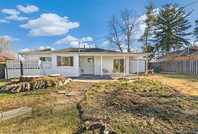 a view of large house with a large tree