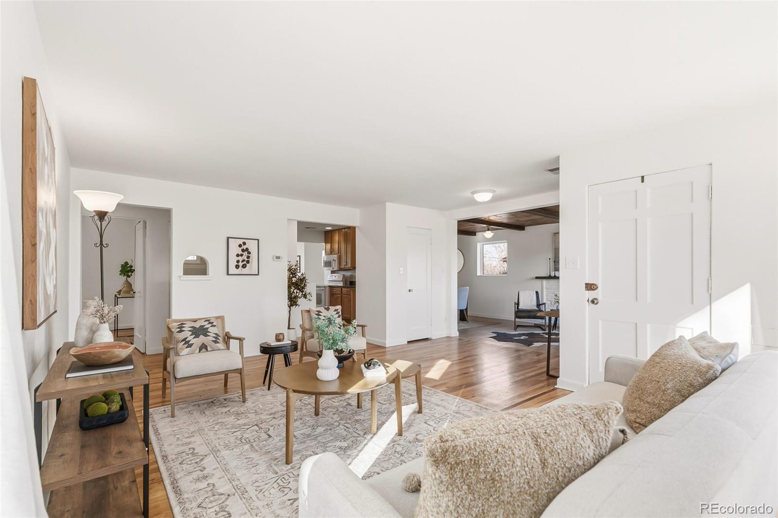 4535 Zephyr Street Wheat Ridge, CO 80033 - Photo 5 of 35 a living room with furniture