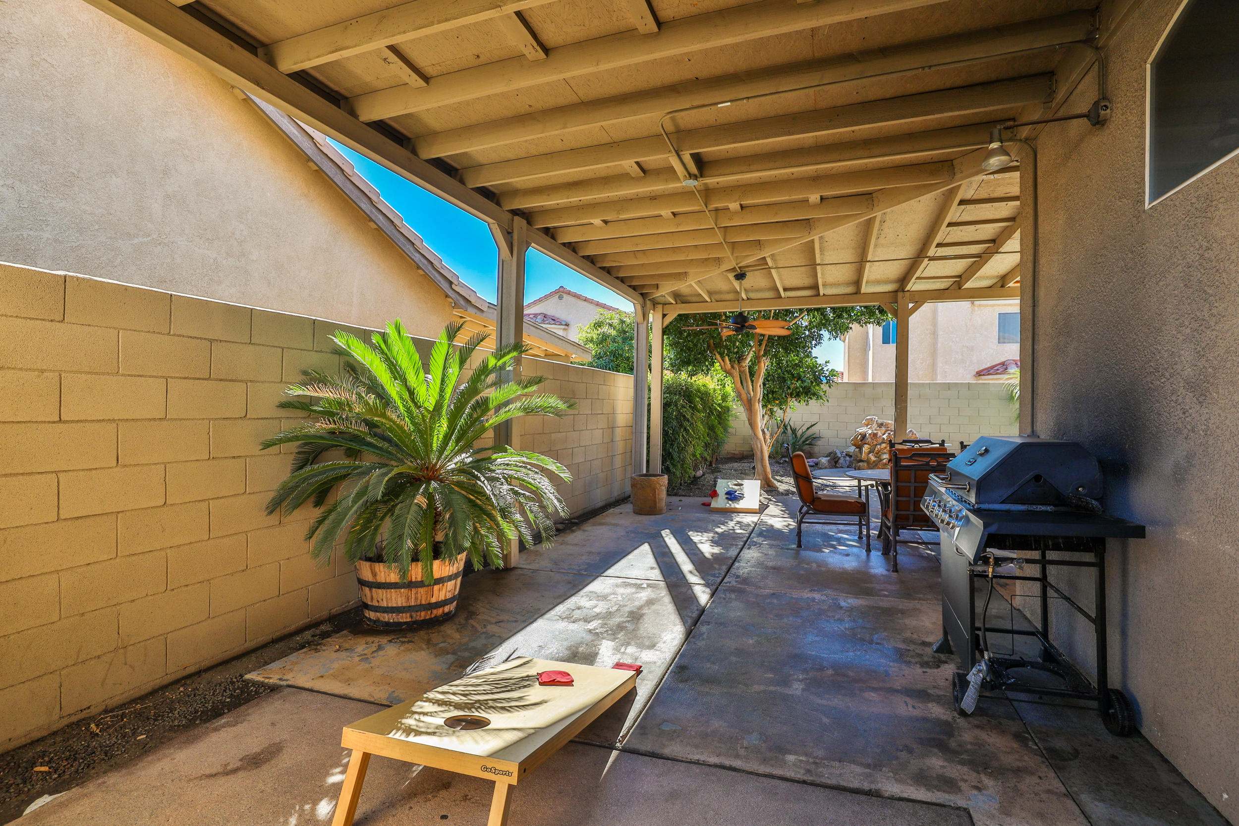 80721 Sycamore Lane Indio, CA 92201 - Photo 11 of 35 a backyard of a house with seating space