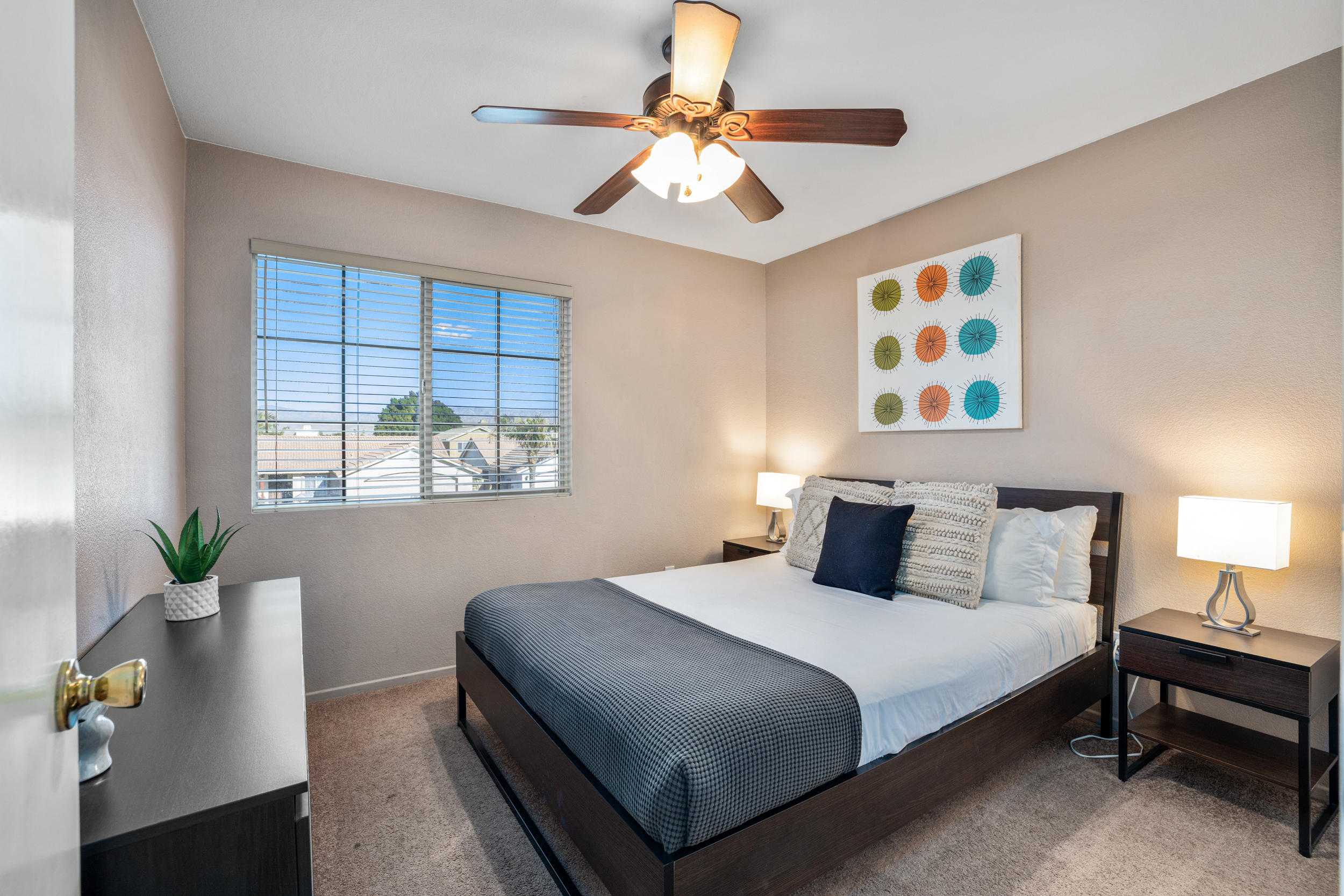 80721 Sycamore Lane Indio, CA 92201 - Photo 12 of 35 a bedroom with a bed and a window