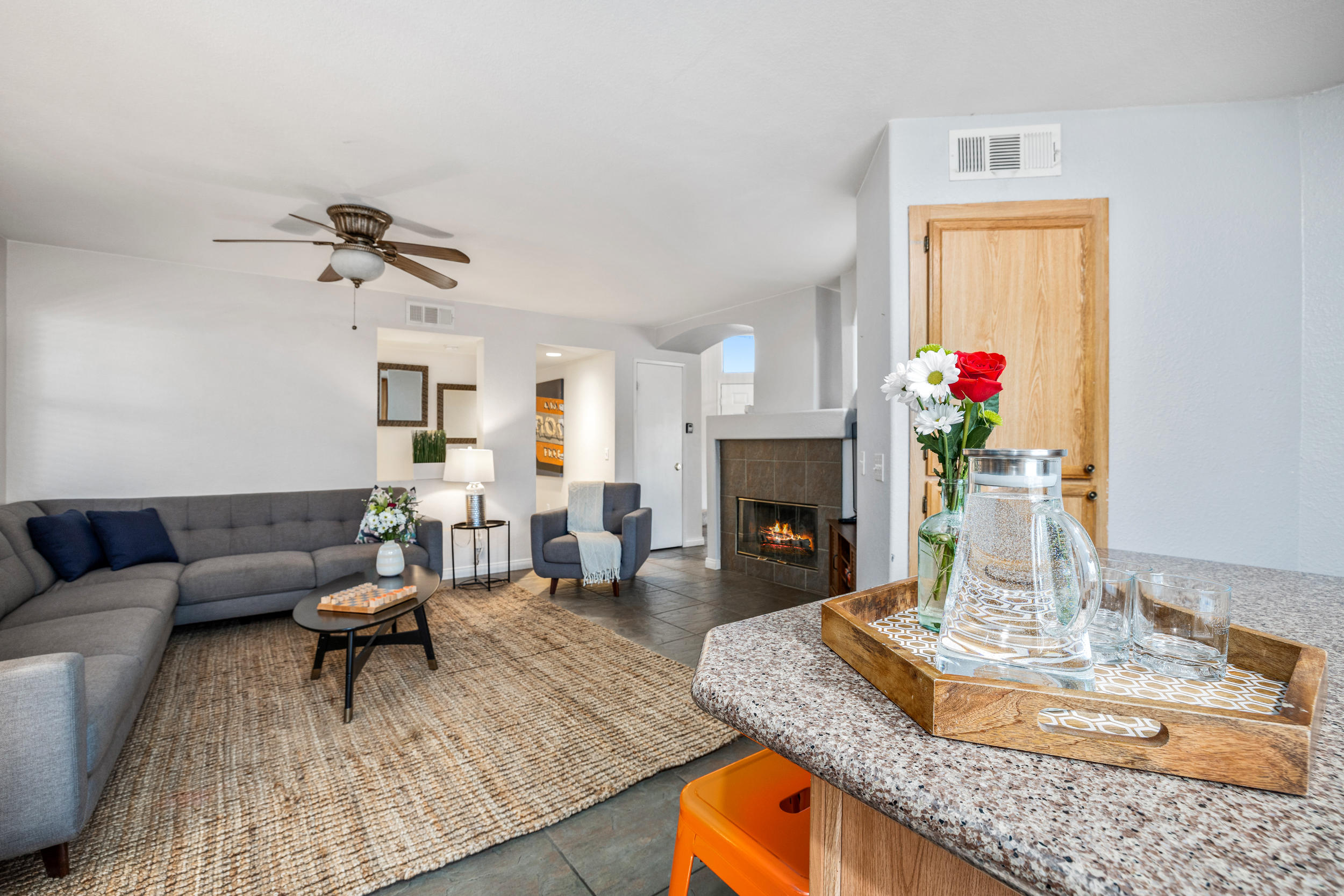 80721 Sycamore Lane Indio, CA 92201 - Photo 25 of 35 a living room with furniture and a fireplace