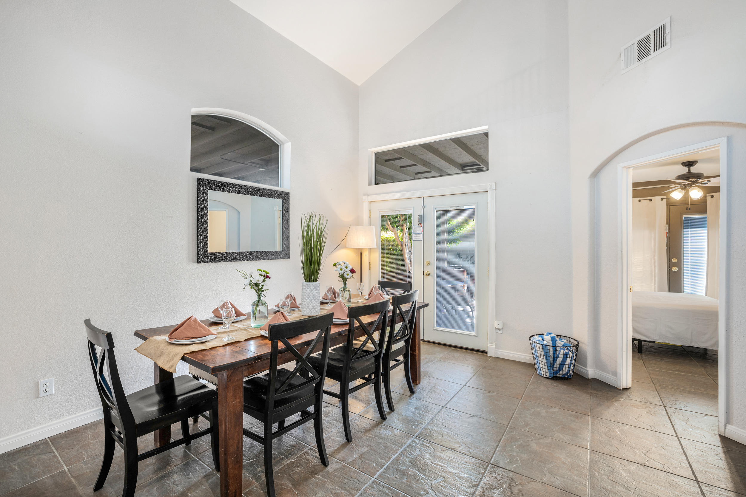 80721 Sycamore Lane Indio, CA 92201 - Photo 4 of 35 a view of a dining room with furniture and chandelier
