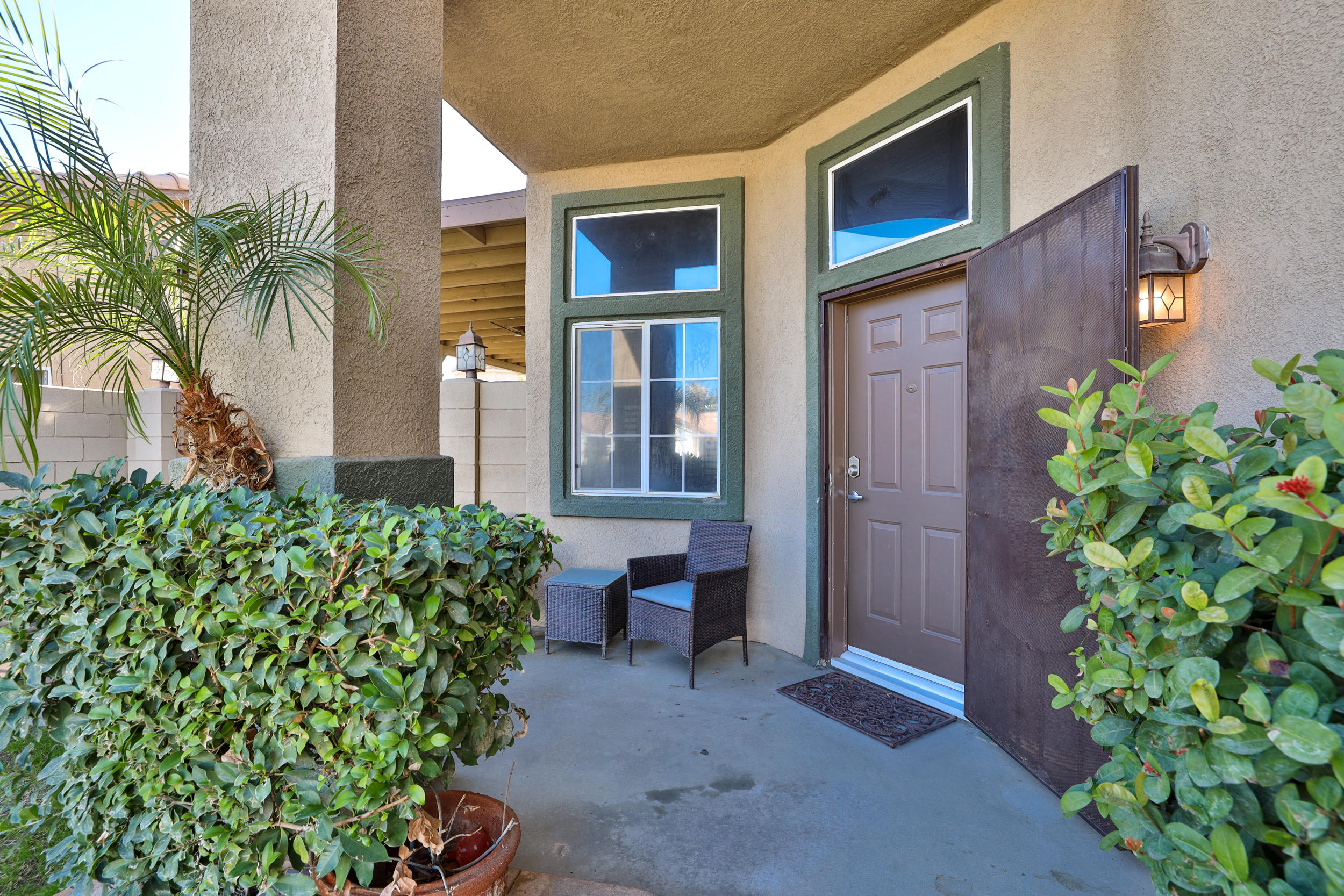 80721 Sycamore Lane Indio, CA 92201 - Photo 35 of 35 a front view of a house with a yard