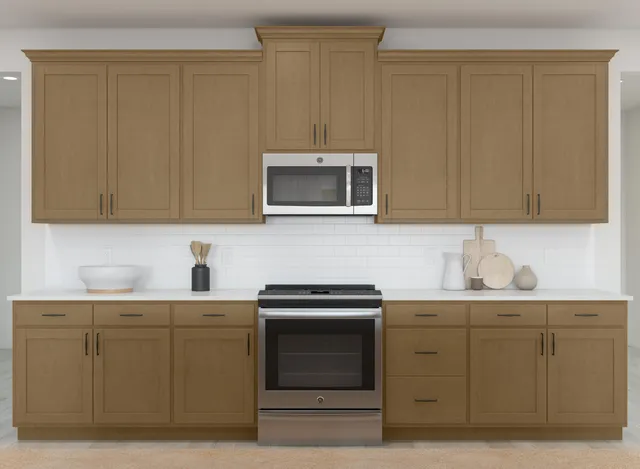 a kitchen with sink cabinets and microwave