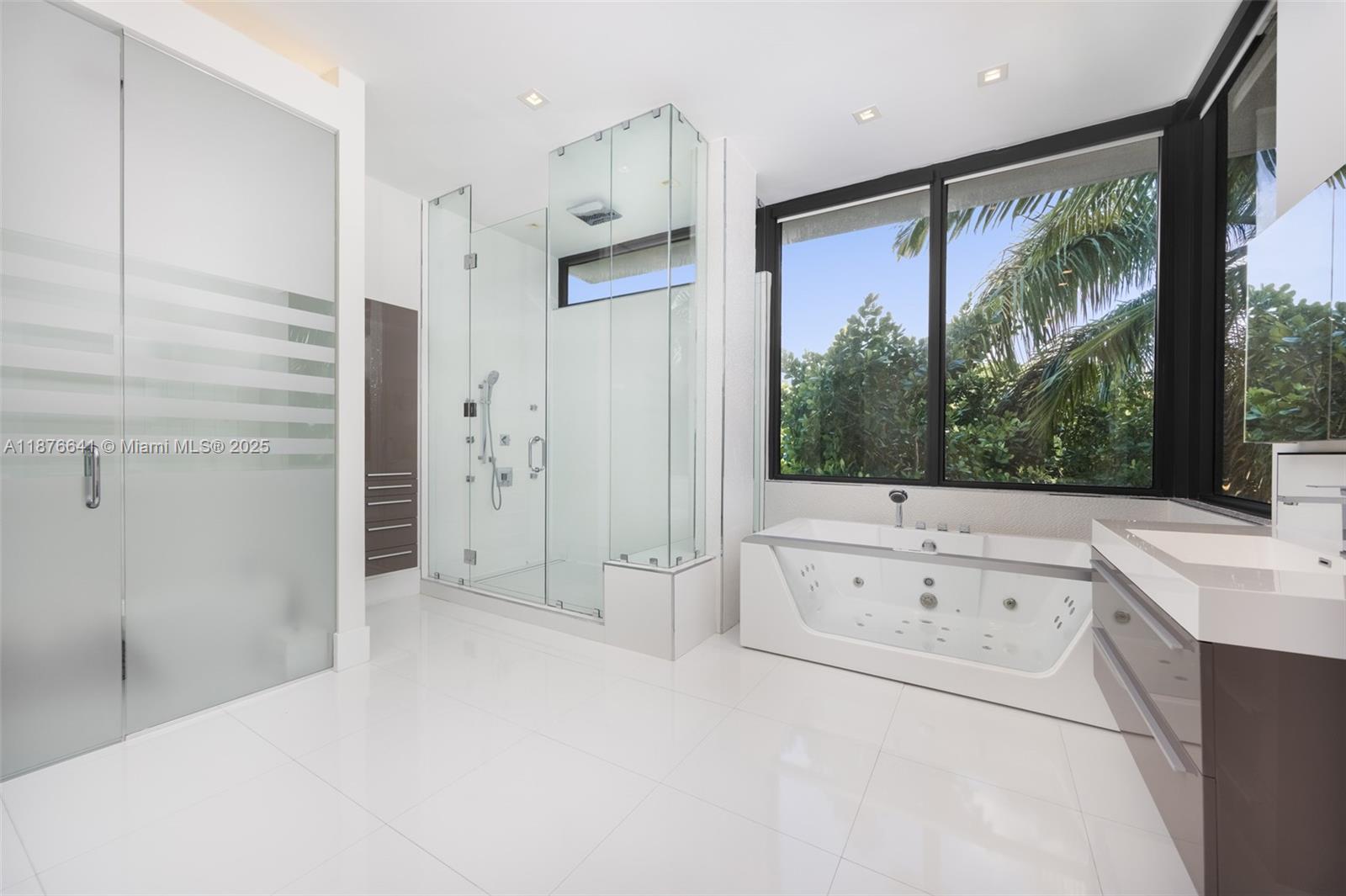 2321 Trapp Avenue Coconut Grove, FL 33133 - Photo 22 of 38 a view of a walk in closet and bedroom view