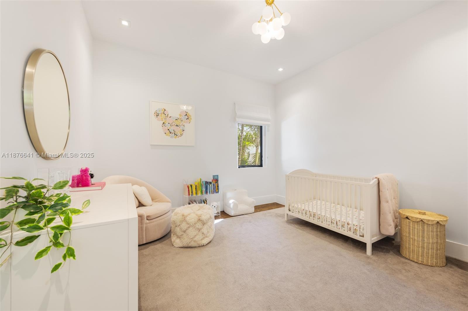 2321 Trapp Avenue Coconut Grove, FL 33133 - Photo 27 of 38 a bedroom with furniture and a mirror