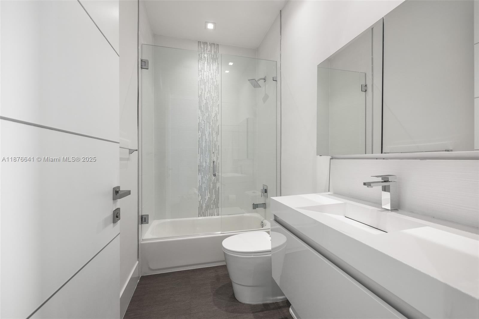 2321 Trapp Avenue Coconut Grove, FL 33133 - Photo 28 of 38 a bathroom with a sink a toilet and shower