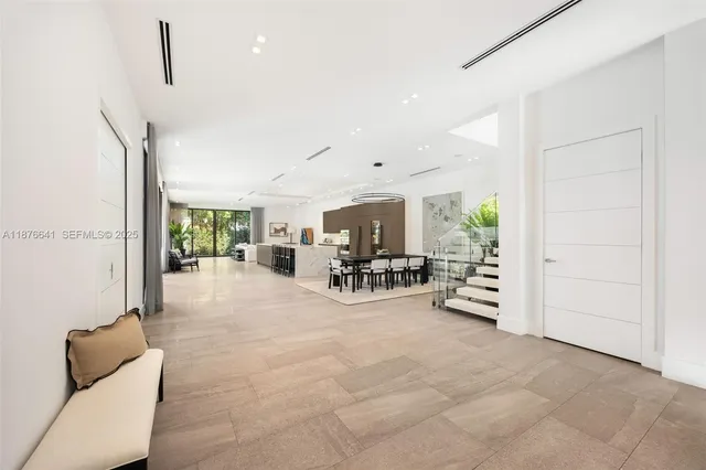 a view of livingroom with furniture and white walls
