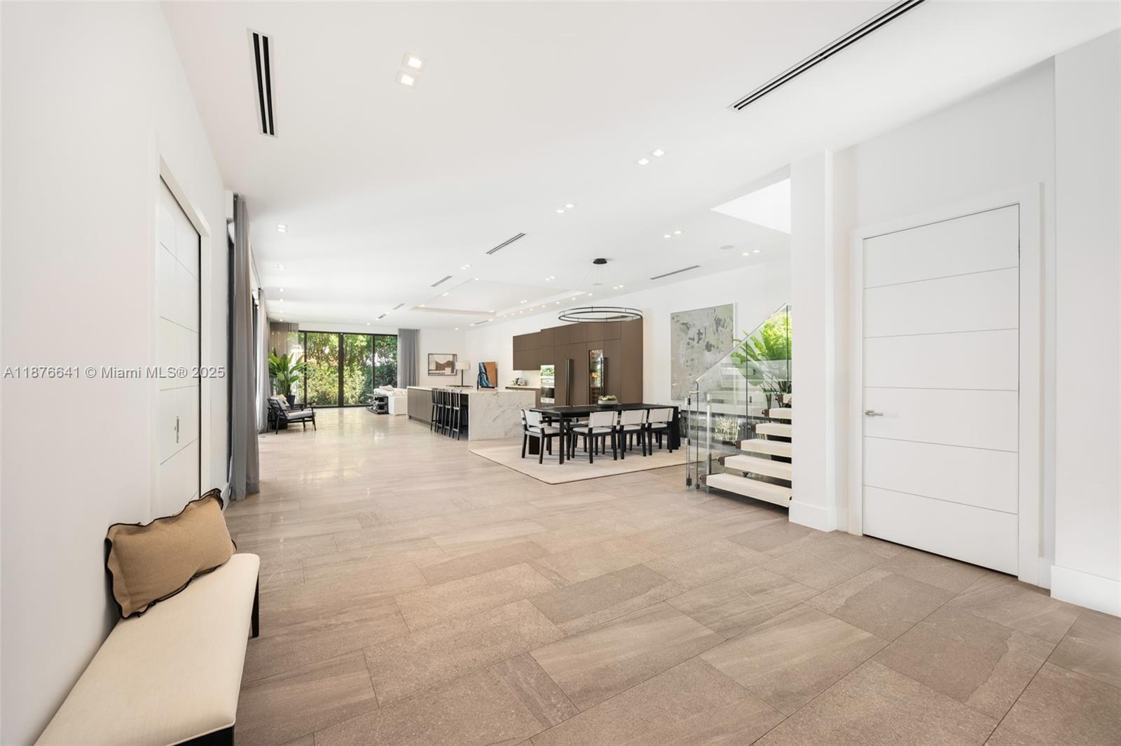 2321 Trapp Avenue Coconut Grove, FL 33133 - Photo 3 of 38 a view of livingroom with furniture and white walls