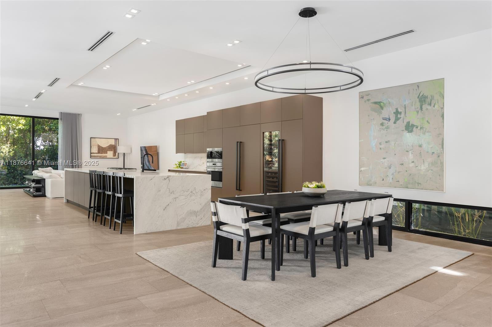 2321 Trapp Avenue Coconut Grove, FL 33133 - Photo 5 of 38 a view of a dining room with furniture