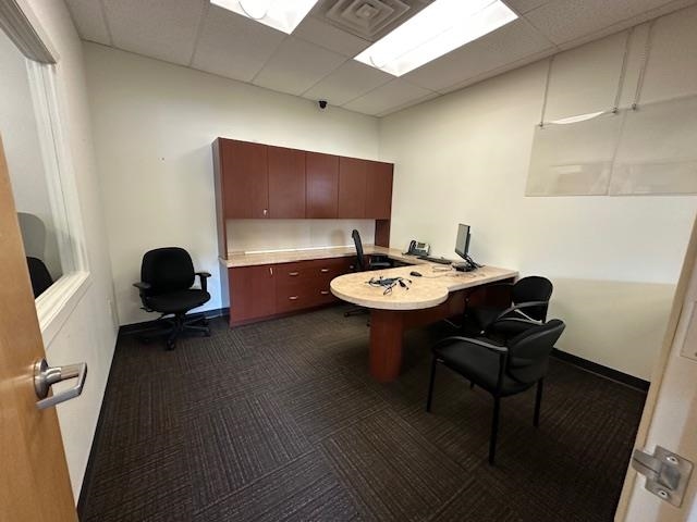 31 Central Boulevard Babbitt, MN 55706 - Photo 11 of 14 Home office featuring a paneled ceiling and built in desk