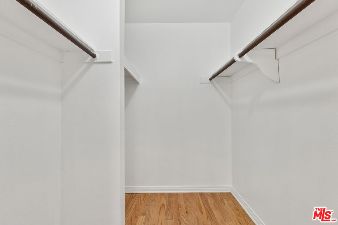 7202 Raintree Circle Culver City, CA 90230 - Photo 9 of 17 a view of walk in closet with empty racks