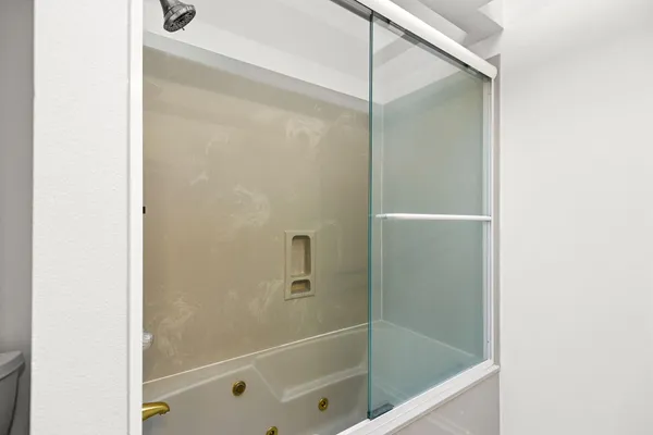 a view of a room with a large window