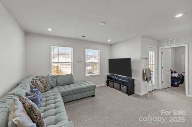 a view of a livingroom and a hallway