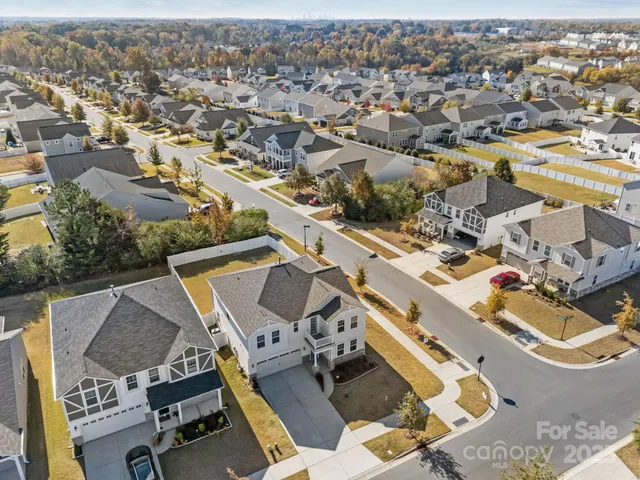 an entryway with wooden floor
