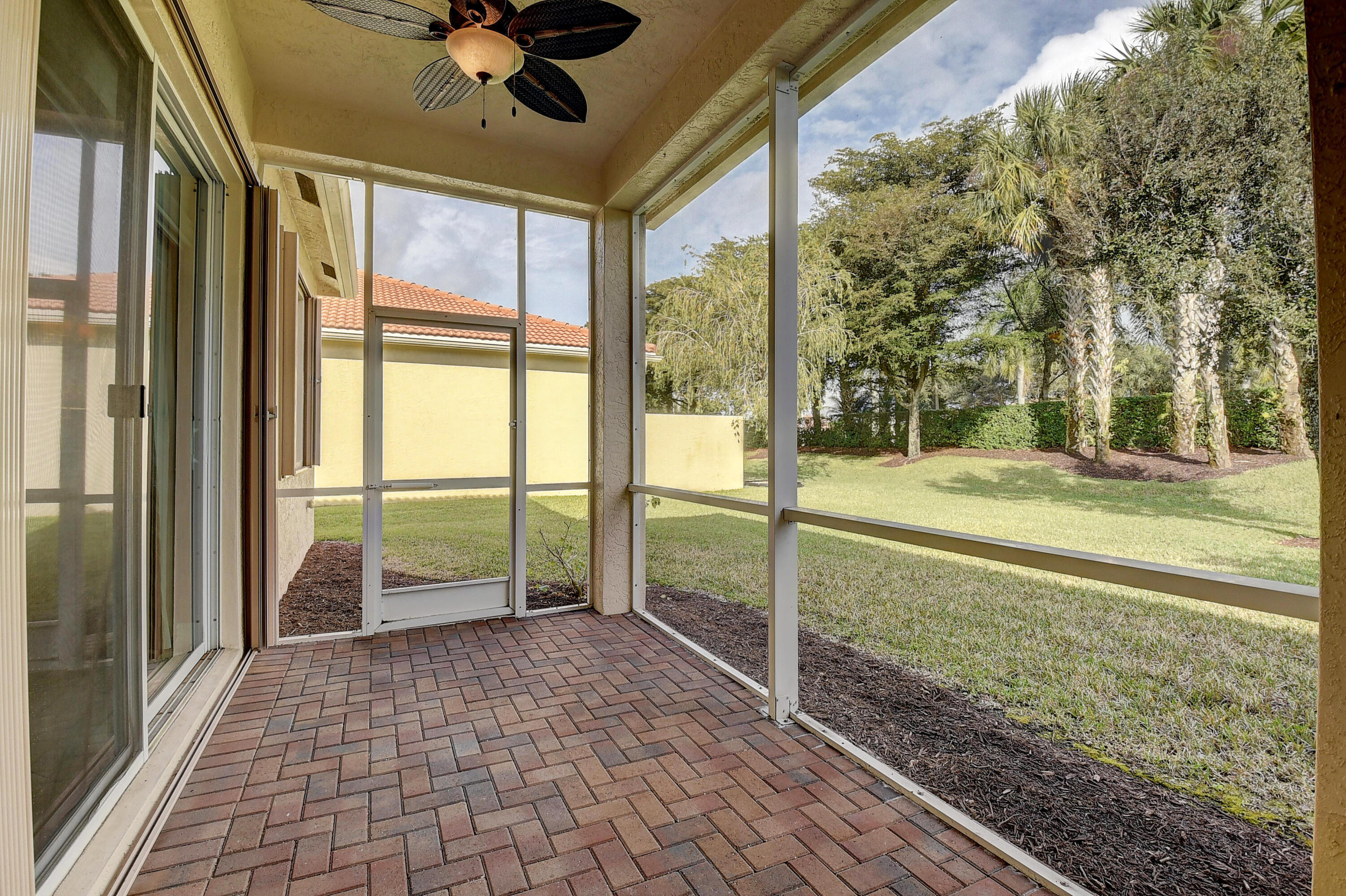 9361 Ivory Isle Road Boynton Beach, FL 33473 - Photo 24 of 66 PATIO AND GARDEN VIEW