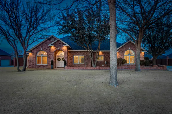 a house with trees in front of it