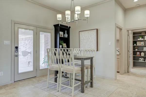 a kitchen with stainless steel appliances granite countertop a stove microwave and sink