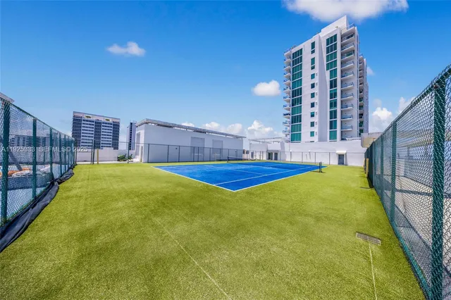 swimming pool with outdoor seating and yard