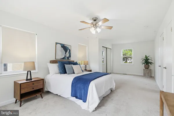 a view of backyard with swimming pool