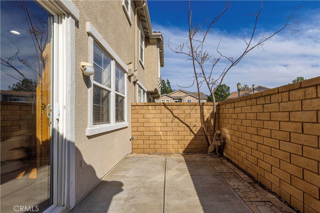 11450 Church Street, Unit 23 Rancho Cucamonga, CA 91730 - Photo 20 of 44 a view of a pathway both side of building