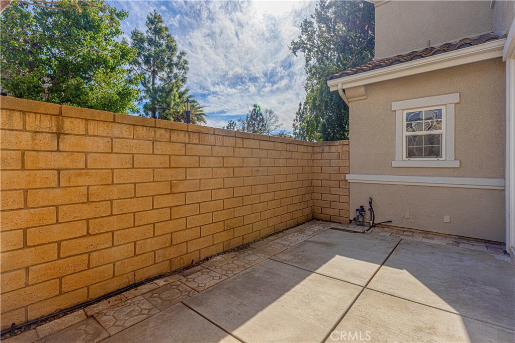 11450 Church Street, Unit 23 Rancho Cucamonga, CA 91730 - Photo 23 of 44 a view of a backyard