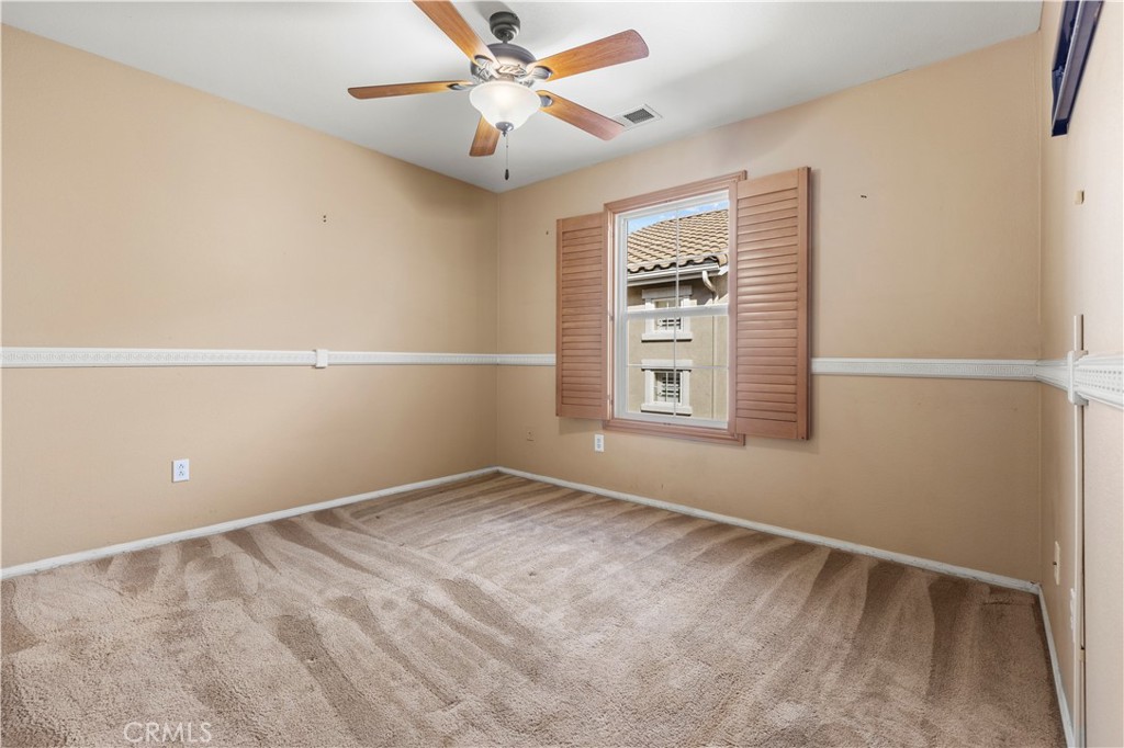 11450 Church Street, Unit 23 Rancho Cucamonga, CA 91730 - Photo 24 of 44 a view of an empty room with a window