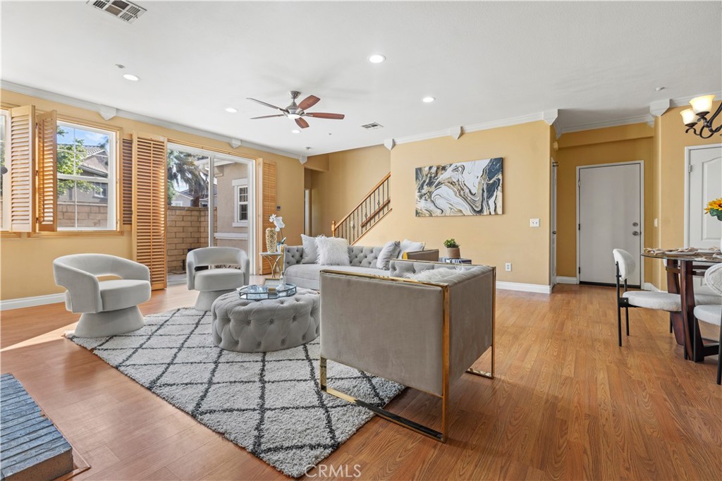 11450 Church Street, Unit 23 Rancho Cucamonga, CA 91730 - Photo 3 of 44 a living room with furniture and a large window
