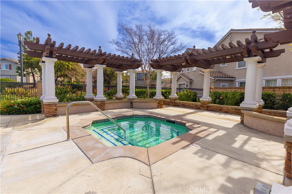 11450 Church Street, Unit 23 Rancho Cucamonga, CA 91730 - Photo 40 of 44 a view of a house with swimming pool and sitting area