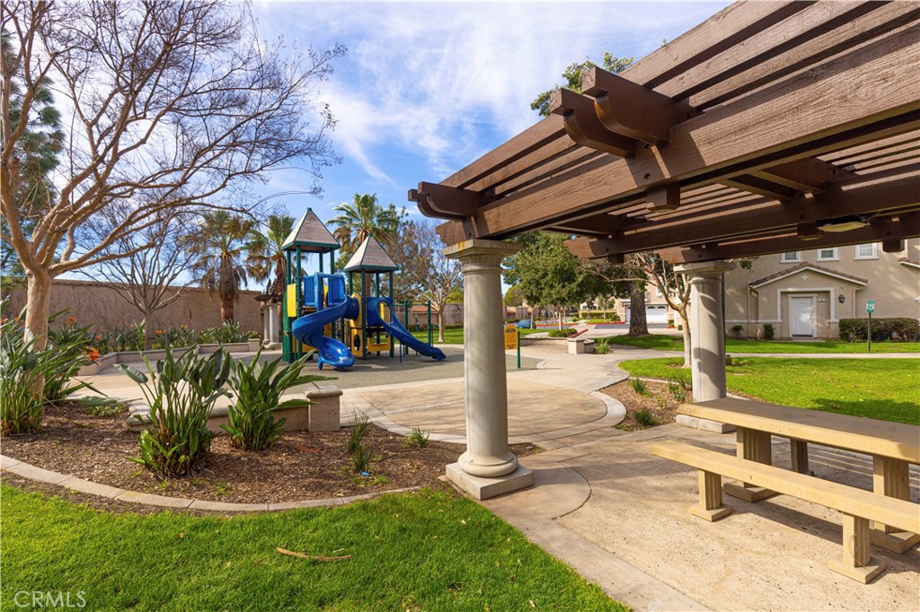 11450 Church Street, Unit 23 Rancho Cucamonga, CA 91730 - Photo 43 of 44 a view of a backyard with a patio