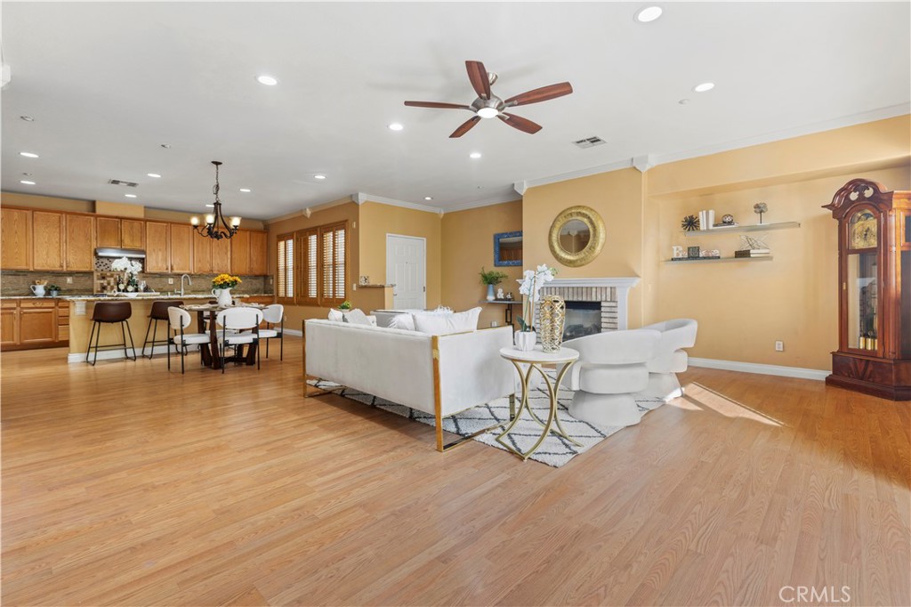 11450 Church Street, Unit 23 Rancho Cucamonga, CA 91730 - Photo 7 of 44 a living room with furniture and kitchen view