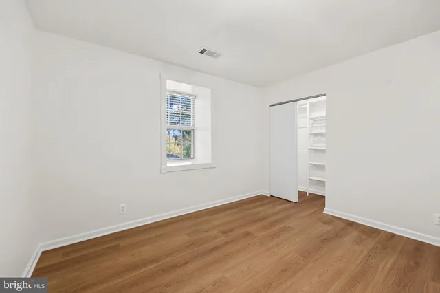 an empty room with windows