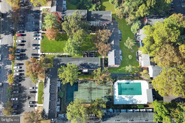 an aerial view of a houses with outdoor space