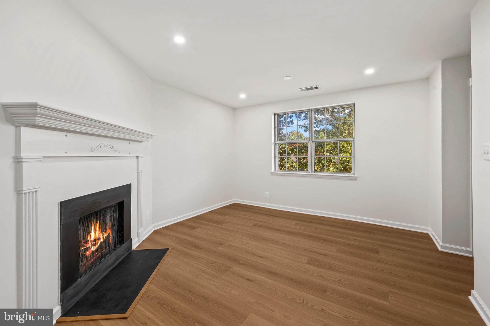 4619 28th Road South, Unit C Arlington, VA 22206 - Photo 10 of 31 a view of an empty room and fire place