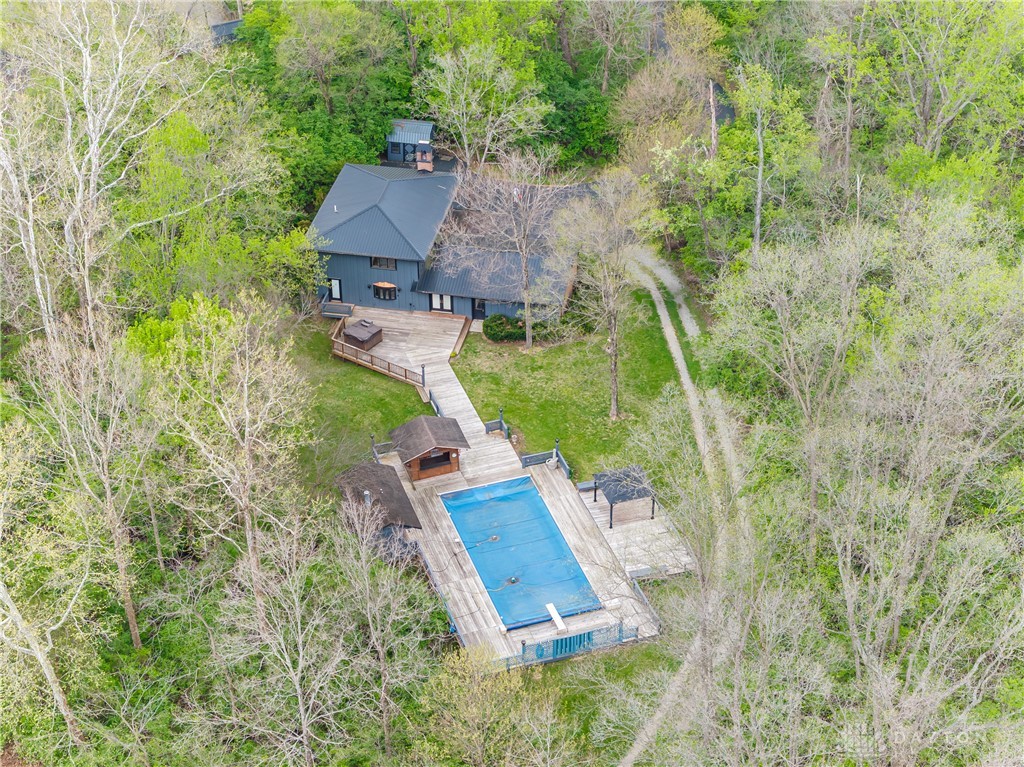 6750 Little Twin Road Germantown, OH 45327 - Photo 75 of 88 This secluded residence offers a private pool deck, surrounded by mature trees.