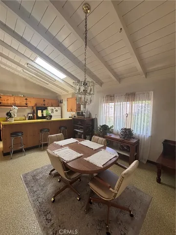 a work room with furniture and window