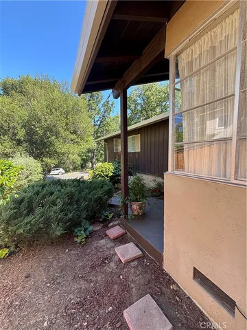 a view of a backyard with garden
