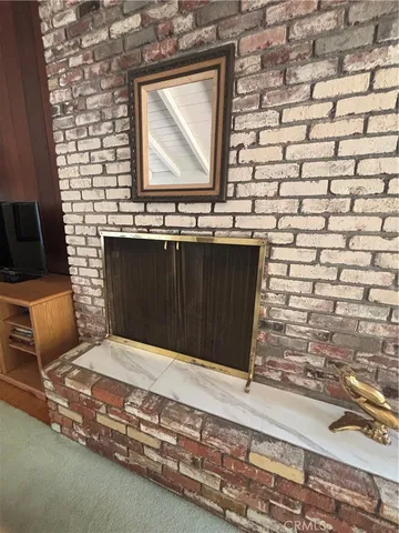 a living room with a fireplace