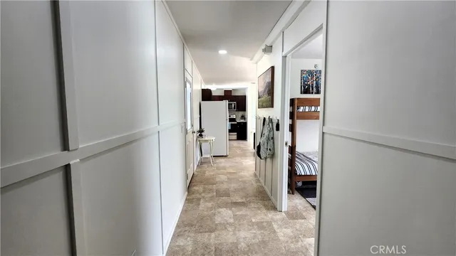 a view of a hallway with a furniture