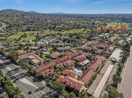 an aerial view of a city with lots of residential buildings
