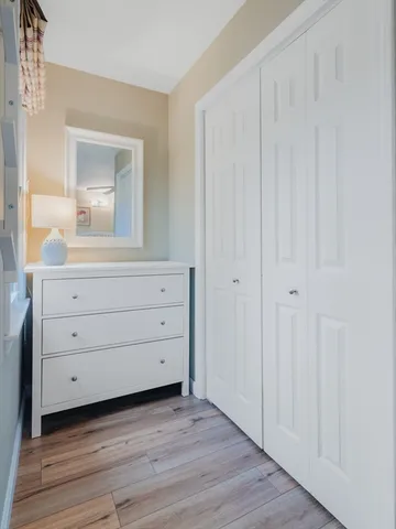 a room with a dresser in it